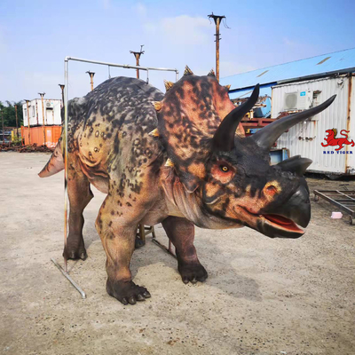 Costume da dinosauro triceratopo adulto realistico personalizzato per due artisti