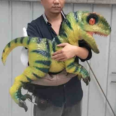 Giocattolo Animatronic impermeabile del bambino del dinosauro di grande simulazione personalizzabile popolare più sveglia in mani per il parco a tema