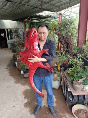 Il burattino realistico Animatronic del bambino del dinosauro del comando manuale ha personalizzato